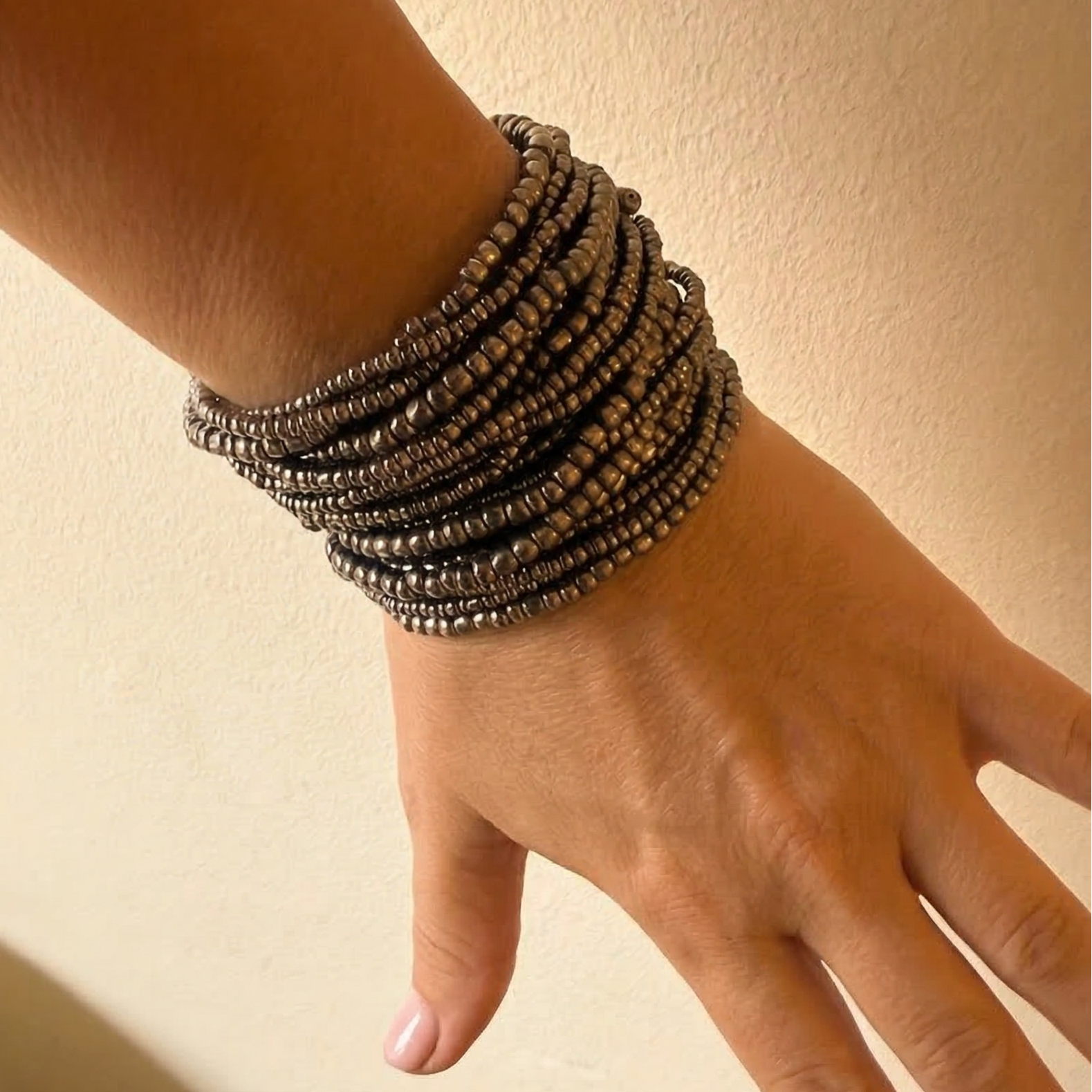 21 strand beaded bracelet - silver metal glass