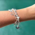 Silver beaded bracelet with flower charms